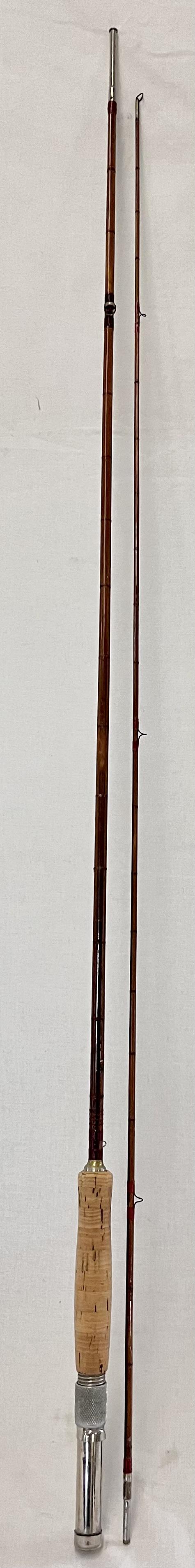 VINTAGE MONTAGUE 2 PIECE BAMBOO FLY ROD: VINTAGE MONTAGUE 2 PIECE BAMBOO FLY ROD - ORIGINAL LABEL INTACT - MEASURES 83" LONG - GOOD OVERALL CONDITION