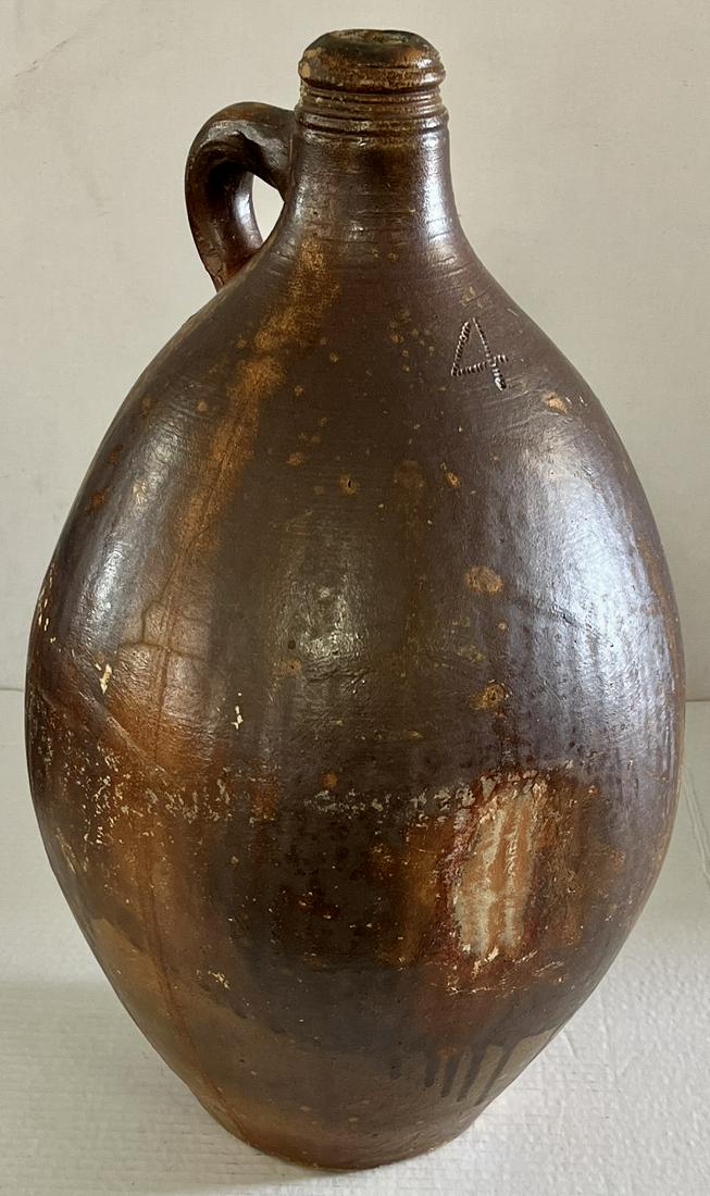 LATE 18TH EARLY 19TH C. GERMAN OVOID STONEWARE JUG: LATE 18TH EARLY 19TH C. GERMAN 4 GALLON OVOID STONEWARE JUG - COGGLED "4" REPRESENTING THE GALLON CAPACITY - GOOD OVERALL CONDITION WITH NO CHIPS, CRACKS OR REPAIRS - 17 3/4" HIGH, 11" DIAMETER