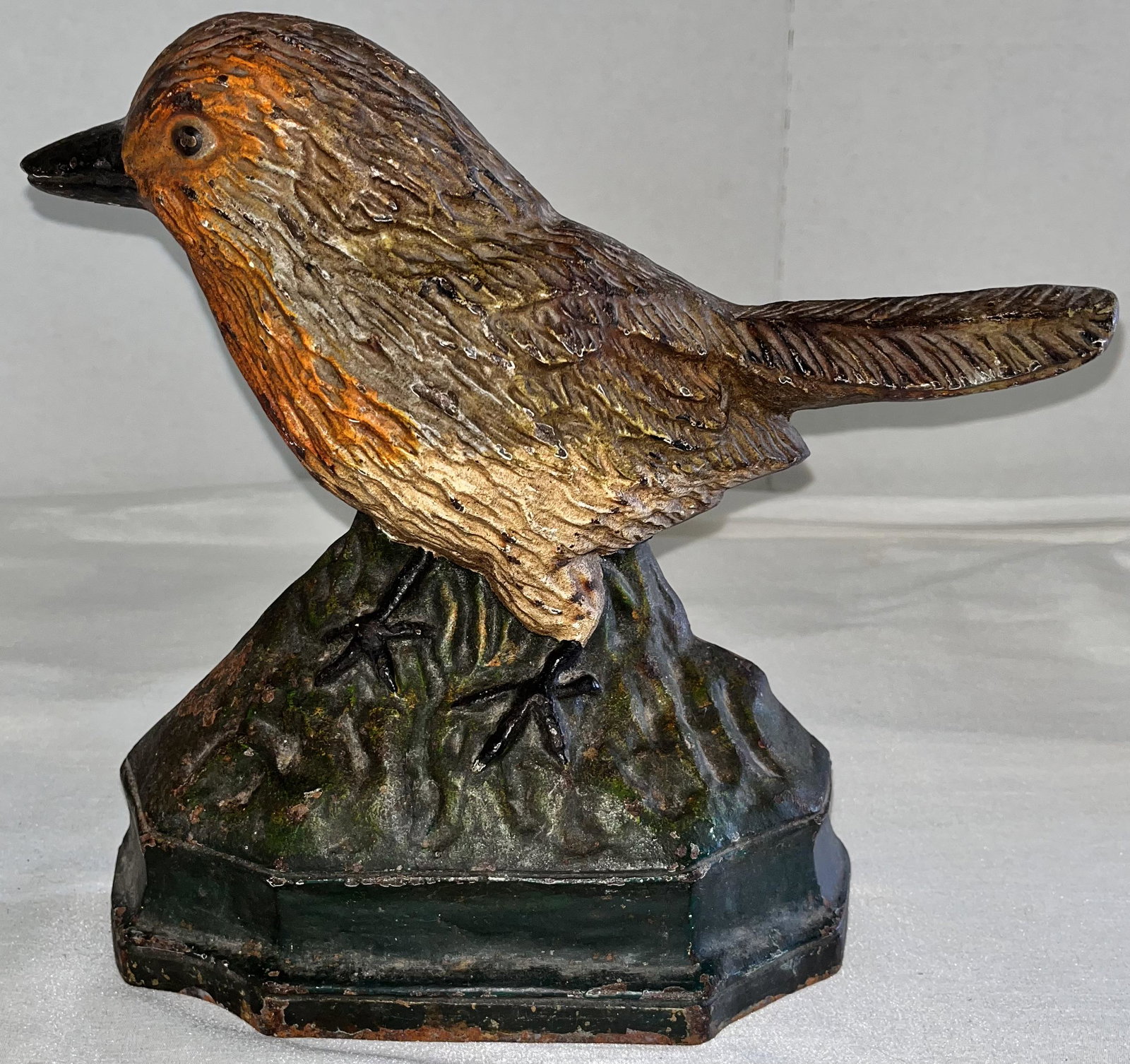 CAST IRON BIRD DOORSTOP IN ORIGINAL PAINT: CAST IRON BIRD DOORSTOP IN GOOD ORIGINAL PAINT - 9 3/4" HIGH, 11 1/4" WIDE, 2 7/8" DEEP