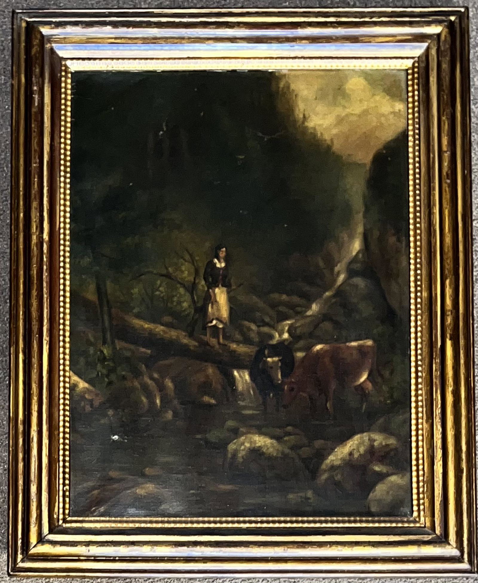 19TH C. FRAMED O/C LANDSCAPE PAINTING W/ COWS: 19TH C. FRAMED O/C LANDSCAPE PAINTING WITH LADY AND COWS AT THE CREEK - NEEDS CLEANING (DARK) - GOOD CONDITION - CONDITION AS SEEN IN PHOTOS PROVIDED - FRAME 22 3/4" X 18", SIGHT 18" X 13 3/4"