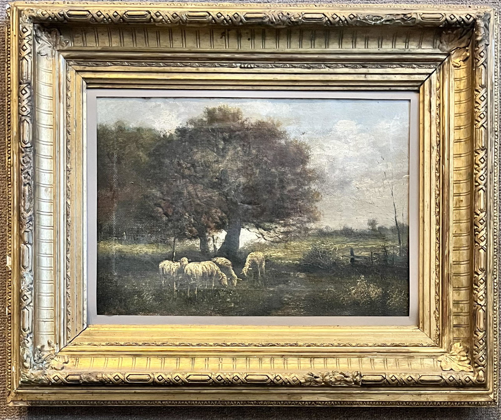 ANTIQUE O/C PAINTING IN GILT FRAME - LANDSCAPE W/ SHEEP: ANTIQUE OIL ON CANVAS PAINTING IN GILT FRAME - LANDSCAPE W/ SHEEP - FRAME 26" X 21 1/4', SIGHT 17 3/4" X 12 1/2" - CONDITION AS SEEN IN PHOTOS PROVIDED