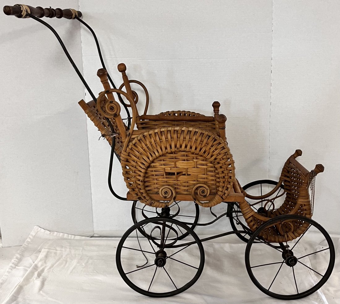 19TH C. VICTORIAN WICKER BABY / DOLL BUGGY: 19TH C. VICTORIAN WICKER BABY / DOLL BUGGY - CONDITION AS SEEN IN PHOTOS PROVIDED - 26" X 12" 27 1/2" HIGH