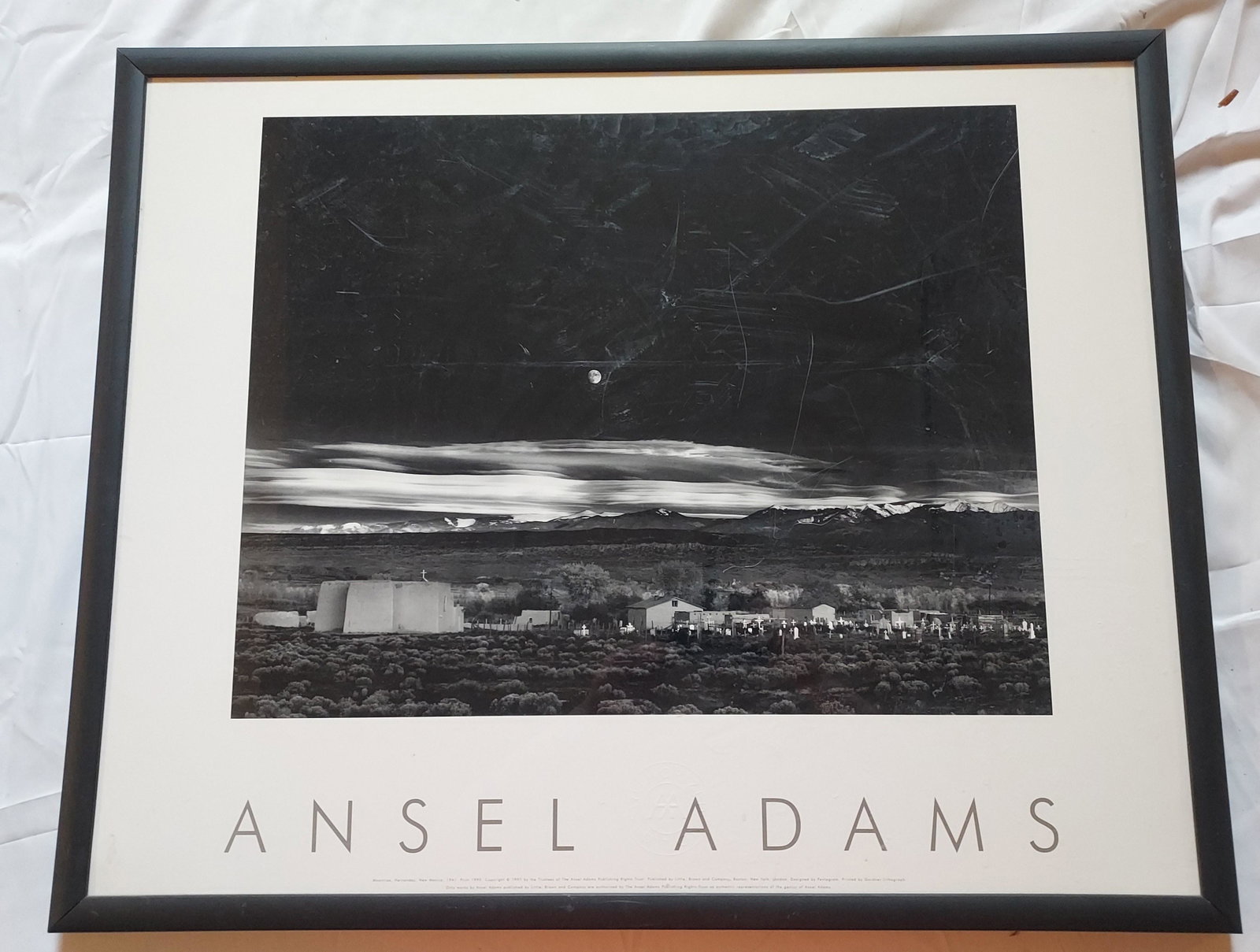 Ansel Adams Moonrise hernandez. some notable scratches to the plexi glass: Ansel Adams Moonrise hernandez. some notable scratches to the plexi glass 31 1/2 x 25 1/2 2lb 13 oz Condition as pictured, unless otherwise noted. If you have any question please contact us.