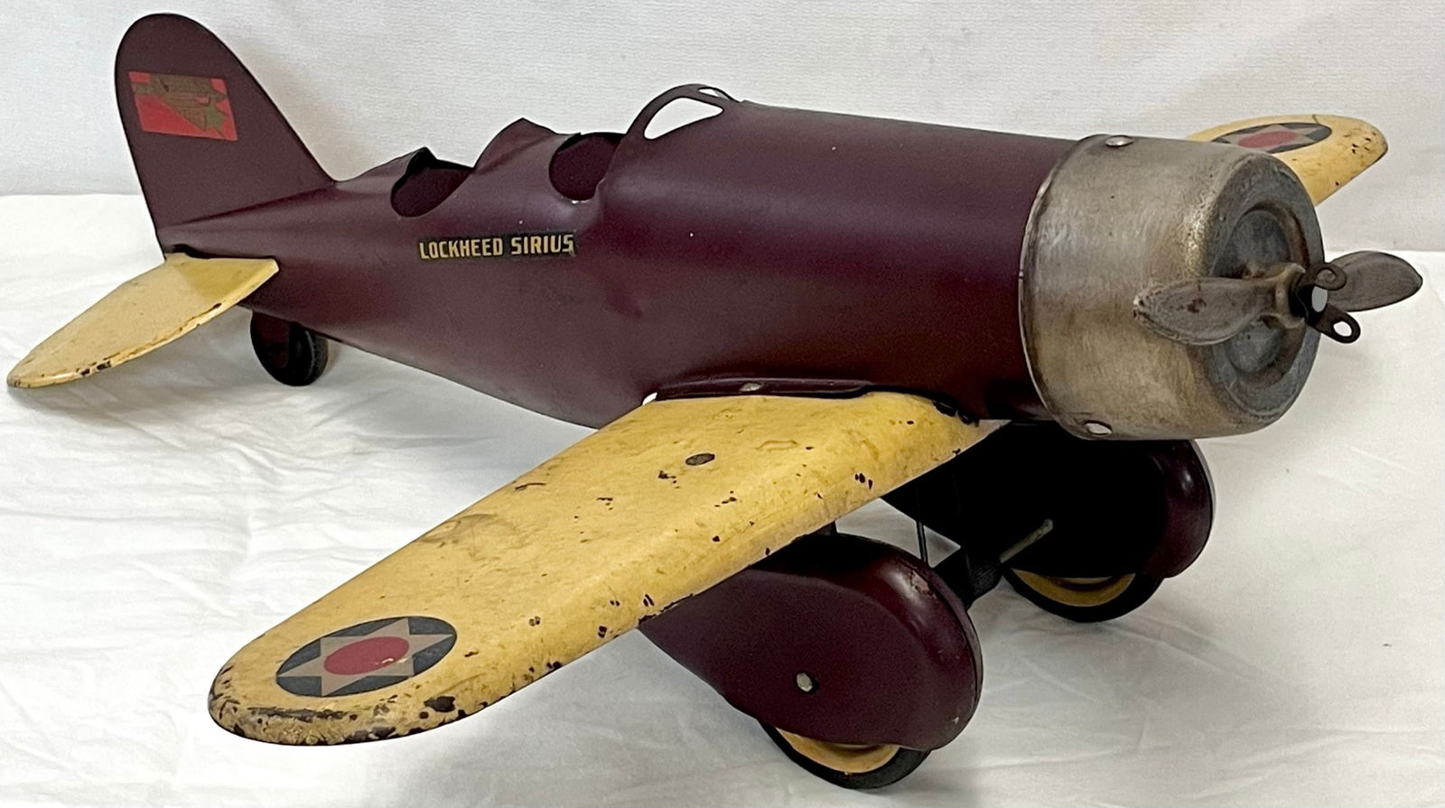 CIRCA 1920'S STEEL CRAFT PRESSED STEEL LOCKHEED SIRIUS AIRPLANE TOY (1 of 16)