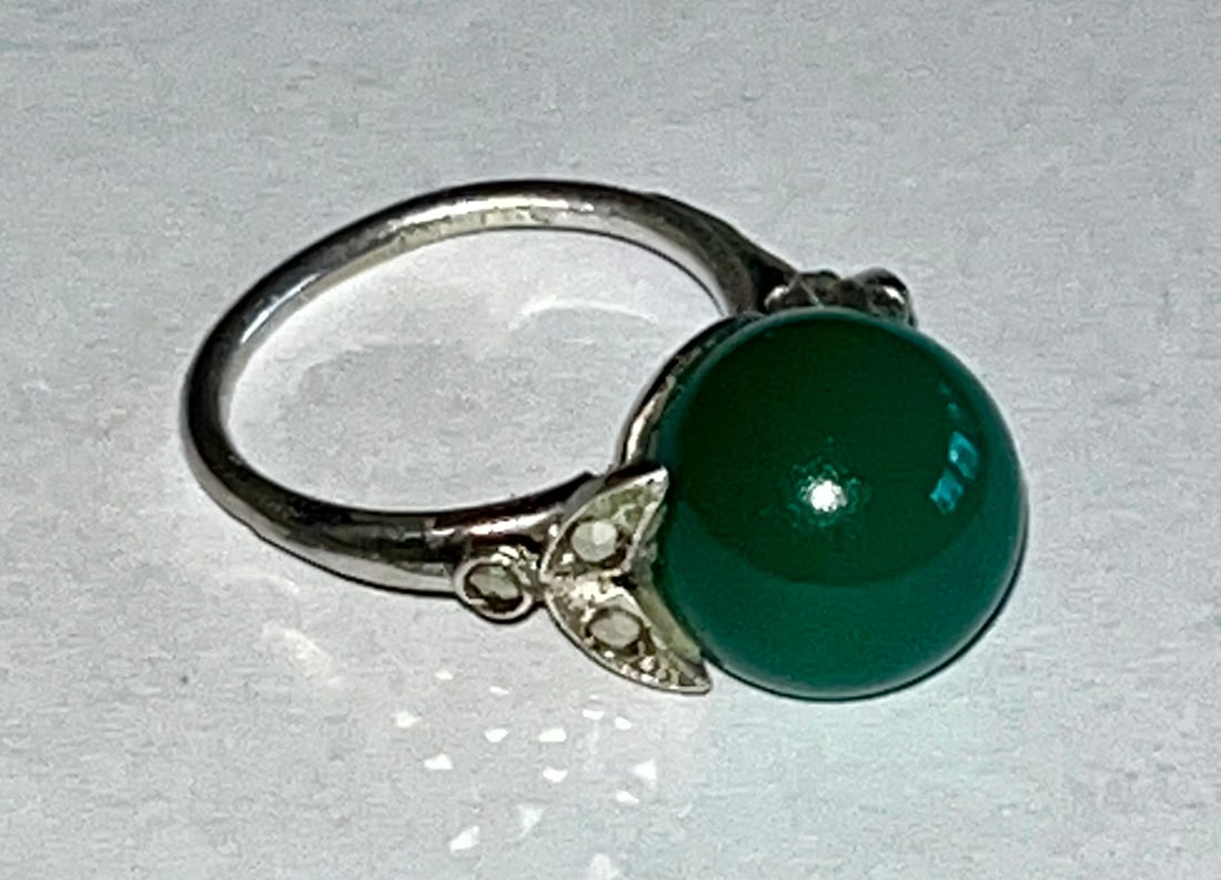 STERLING SILVER, JADE 'PEARL' & MARCASITE RING: STERLING SILVER, JADE 'PEARL' & MARCASITE RING - APPROX. 7/16" DIAMETER STONE - STAMPED STERLING