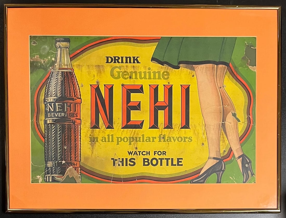ANTIQUE "NEHI BEVERAGES" SODA ADVERTISING SIGN - FRAMED: ANTIQUE "NEHI BEVERAGES" CARDBOARD SODA ADVERTISING SIGN - FRAMED - "DRINK GENUINE NEHI IN ALL POPULAR FLAVORS / WATCH FOR THIS BOTTLE" - FRAME MEASURES APPROX. 24" X 18"