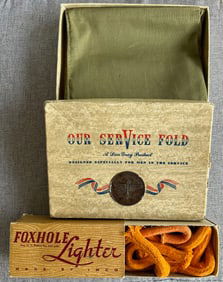 LOT OF 2 U.S. MILITARY ITEMS - FOXHOLE LIGHTER, OUR SERVICE FOLD