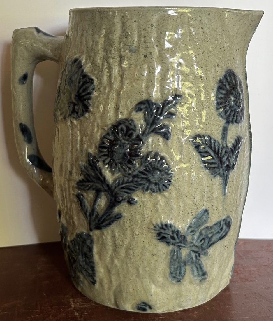 WHITES UTICA STONEWARE PITCHER W/ EMBOSSED FLORAL DEC. (1 of 5)