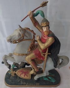 Paint Decorated Metal figure riding a horse