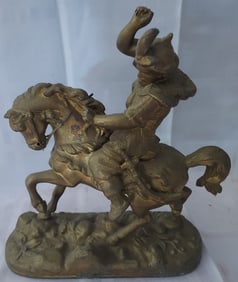 Antique Metal Figure of a Man Riding a Horse