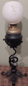 Antique Black Wrought Iron Oil Banquet Lamp with Leaf Motif and Brass Font