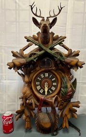 Large Vintage / Antique Carved Wooden Cuckoo Clock with Rifles, Animals, Deer Head, etc.