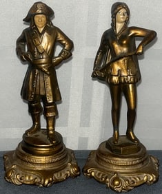PAIR OF BRONZED METAL MALE AND FEMALE FIGURES ON PEDESTAL BASES