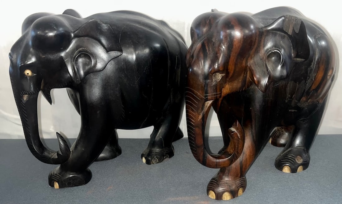 PR OF HEAVY LIGNUM VITAE CARVED WOODEN ELEPHANTS: PR OF HEAVY LIGNUM VITAE CARVED WOODEN ELEPHANTS WITH BONE EYES AND TOE NAILS MEASURING APPROX. 8" HIGH, 8" WIDE, CONDITION AS SEEN IN PHOTOS PROVIDED