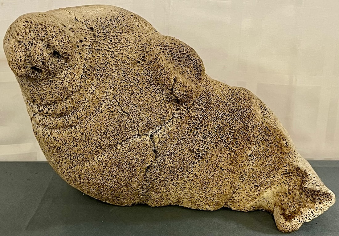 8.5" CARVED FOSSILIZED WHALE BONE INUIT ESKIMO FIGURE OF WALRUS: 8.5" CARVED FOSSILIZED WHALE BONE INUIT ESKIMO FIGURE OF WALRUS, CONDITION AS SEEN IN PHOTOS PROVIDED