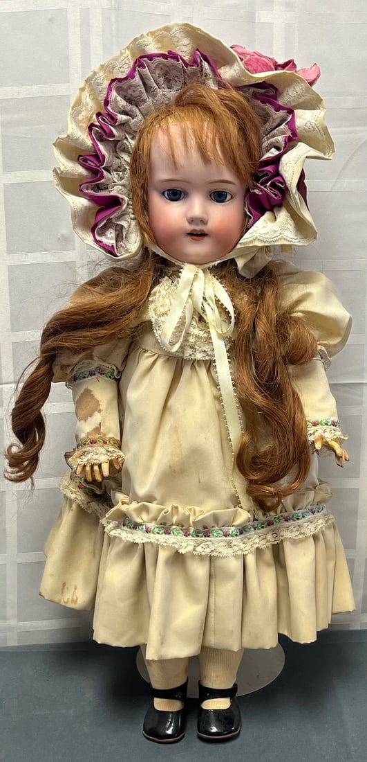 ANTIQUE MORIMURA BROTHERS JAPAN DOLL (C. 1915 - 1926): ANTIQUE MORIMURA BROTHERS JAPAN DOLL (C. 1915 - 1926) WITH PORCELAIN HEAD, JOINTED COMPOSITION BODY, SLEEP EYES, OPEN MOUTH WITH TEETH - MARKED ON BACK OF HEAD, MEASURES APPROX. 22 3/4" HIGH, CONDITIO
