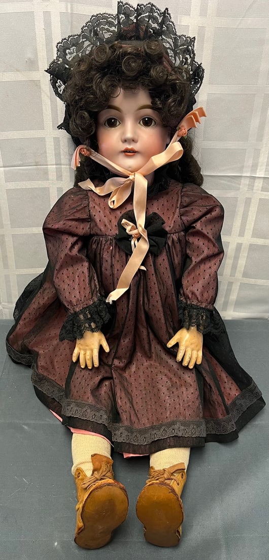 ANTIQUE GERMAN BISQUE HEAD DOLL, SIMON & HALBIG #146, COMPOSITION BODY: Charming turn-of-the-century German 28" bisque head doll by Simon & Halbig, mold 146, marked "Made in Germany 15? 146" to back of head. Features a finely painted bisque socket head with brown glass sl