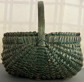 Antique buttock's style oak or ash basket in old green paint
