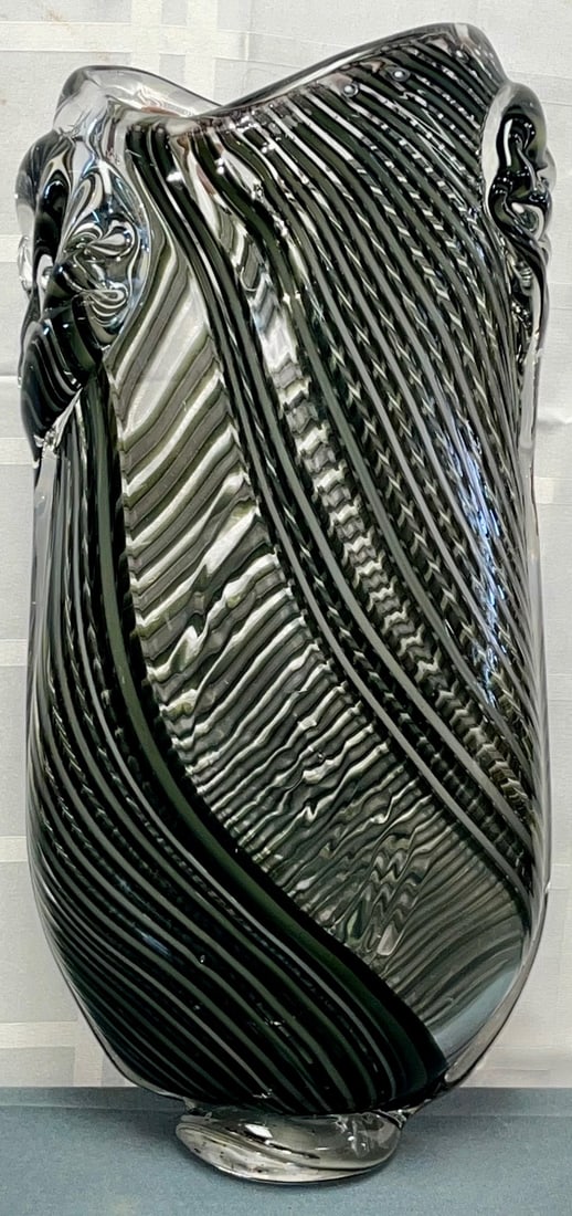 Ona Magaro Signed Studio Art Glass Vase, Hand-Blown, Organic Modern Form, 20th C.: A beautifully hand-blown studio art glass vase by Ona Magaro, an American artist known for her vibrant, freeform glass creations. This piece exhibits a lively, swirling composition of color, with subt