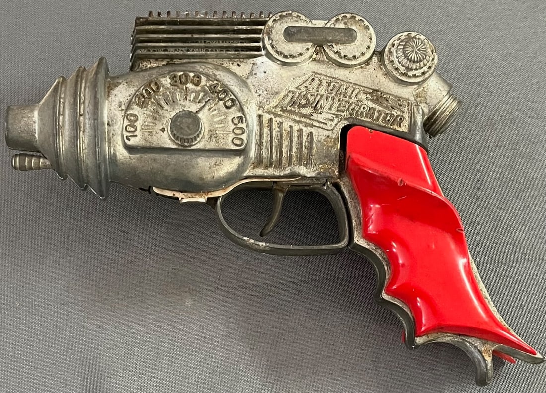 Vintage 1950's Atomic Disintergrator toy cap gun: Vintage 1950's Atomic Disintergrator toy cap gun, good condition, measures approx. 8" long, 5 1/2" high, condition as seen in photos provided
