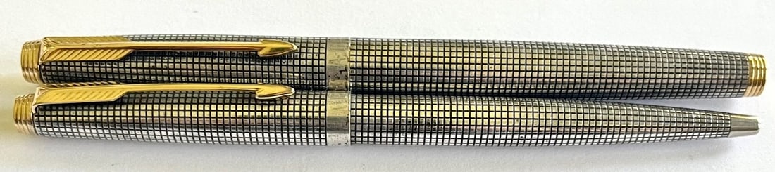 Set of Sterling Silver Parker Pens, Fountain Pen with 14k gold nib, Ball Point Pen: Set of Sterling Silver Parker Pens including a Fountain Pen with 14k gold nib and a Ball Point Pen, both with sterling silver caps and barrels, measure approx. 5" long, condition as seen in photos pro