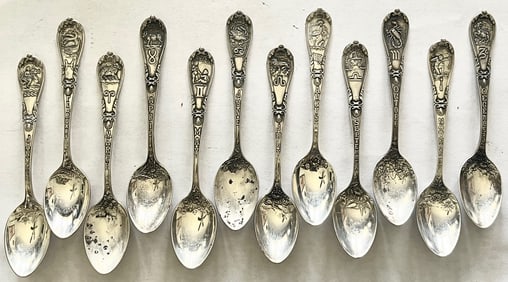 Set of 12 Sterling Silver Zodiac spoons with embossed month, Zodiac symbol & floral dec. 132.71g