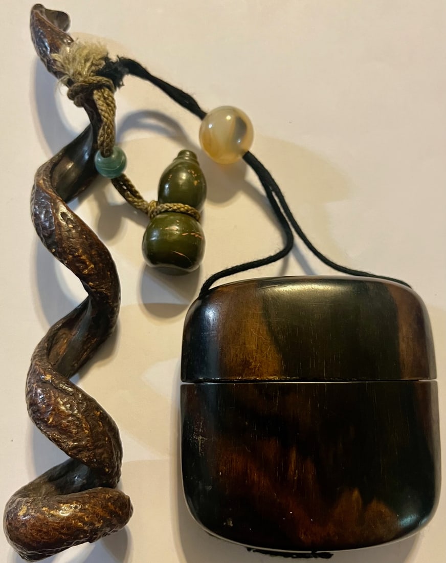 Japanese Edo-style Two-Part Hardwood Inro with Carved Netsuke and Ojime Beads: Japanese Edo-style Two-Part Hardwood Inro with Carved Netsuke and Ojime Beads, A Japanese two-part inro made of richly grained dark hardwood, suspended on a cord with a carved netsuke in the form of a