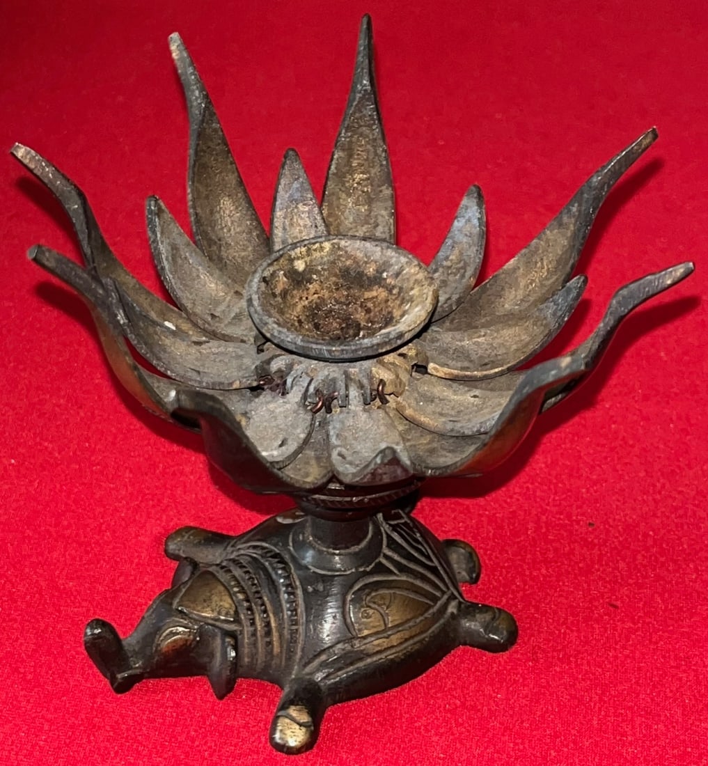Indian Bronze Lotus Blossom Diya (Lamp) on A Figural Turtle Base: Indian Bronze Lotus Blossom Diya (Lamp) hinged petal oil lamp mounted on a Figural Turtle Base, an important and symbolic combination in Hindu and buddhist traditions. A nicely cast Indian brass oil l