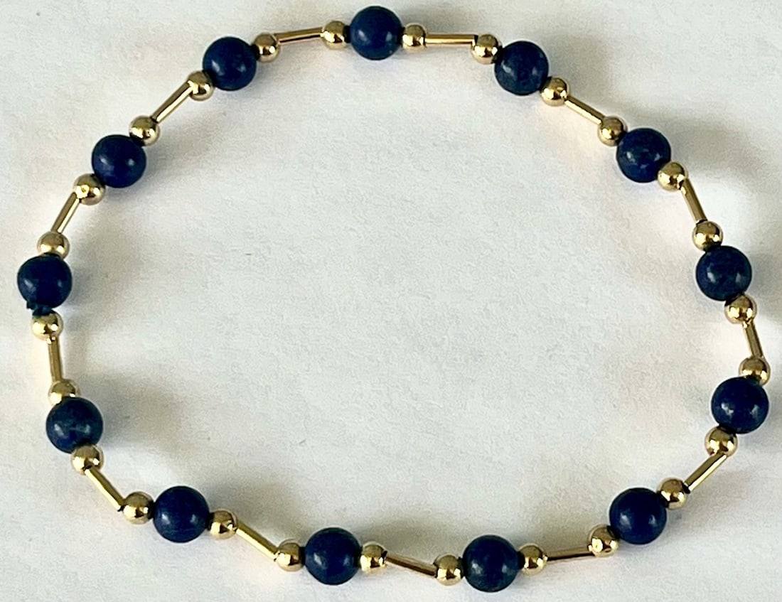 Vintage 14K yellow Gold and Lapis Beaded Bracelet, approx. 7" long: Vintage 14K yellow Gold and Lapis Beaded Bracelet, approx. 7" long, Vintage bracelet featuring alternating deep blue lapis lazuli beads and polished 14K yellow gold beads linked with straight gold con