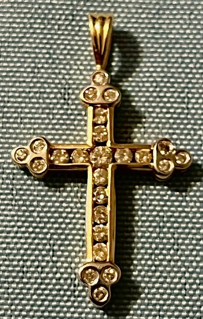 14K Yellow Gold and Diamond Cross Pendant, 24 Small Cut Diamonds: 14K Yellow Gold and Diamond Cross Pendant, stamped and tests 14K, 24 small cut diamonds, measures approx. 1 5/16" high, 3/4" wide