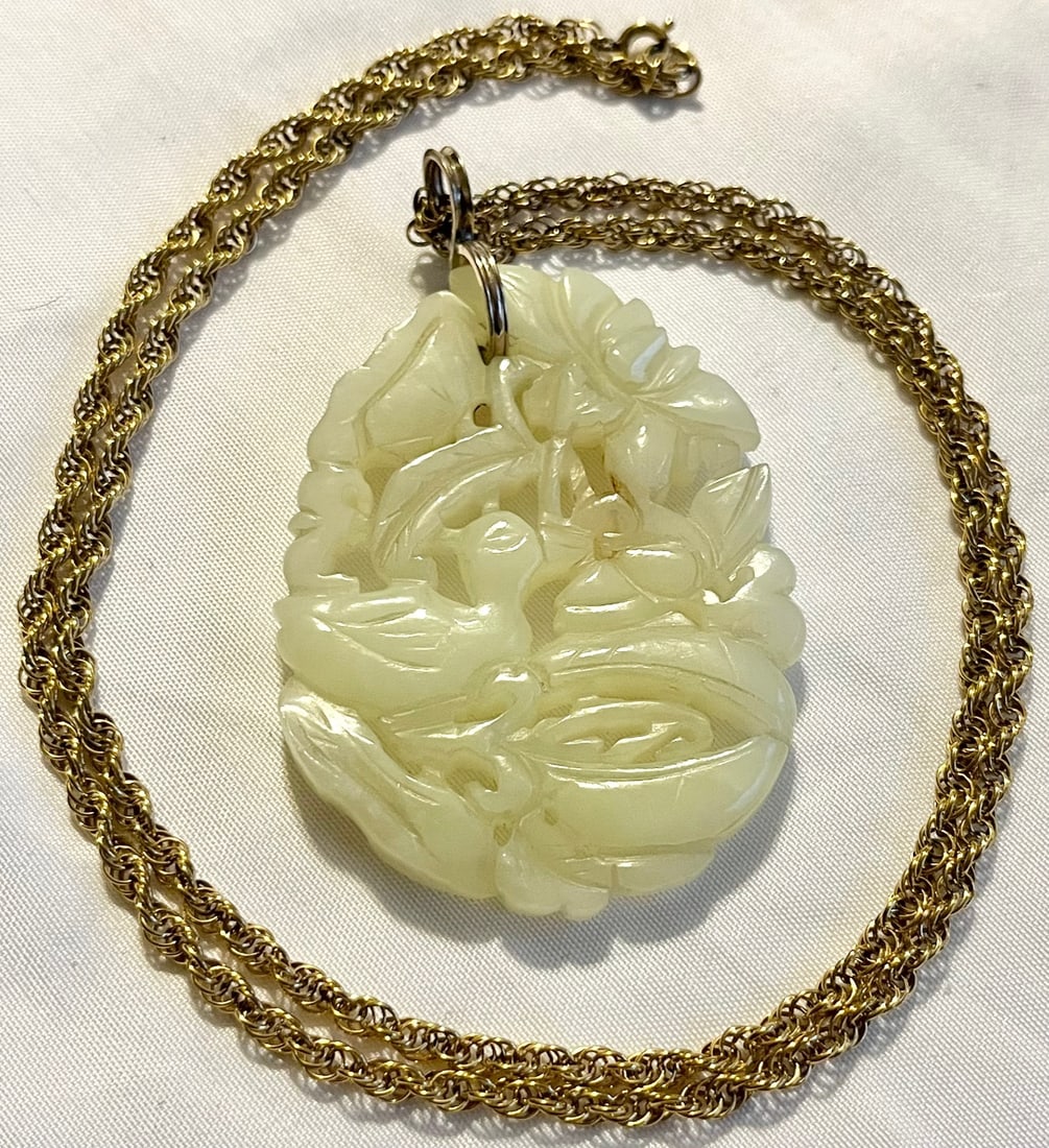 CARVED JADE PENDANT ON 1/20 12K GOLD FILLED ROPE NECKLACE: CARVED JADE PENDANT ON 1/20 12K GOLD FILLED 25 1/2" ROPE CHAIN / NECKLACE, NECKLACE 8.18 GRAMS, ELABORATE CARVED JADE PENDANT WITH BIRD, NEST AND FLOWERS, JADE PENDANT WEIGHS 22.10 GRAMS