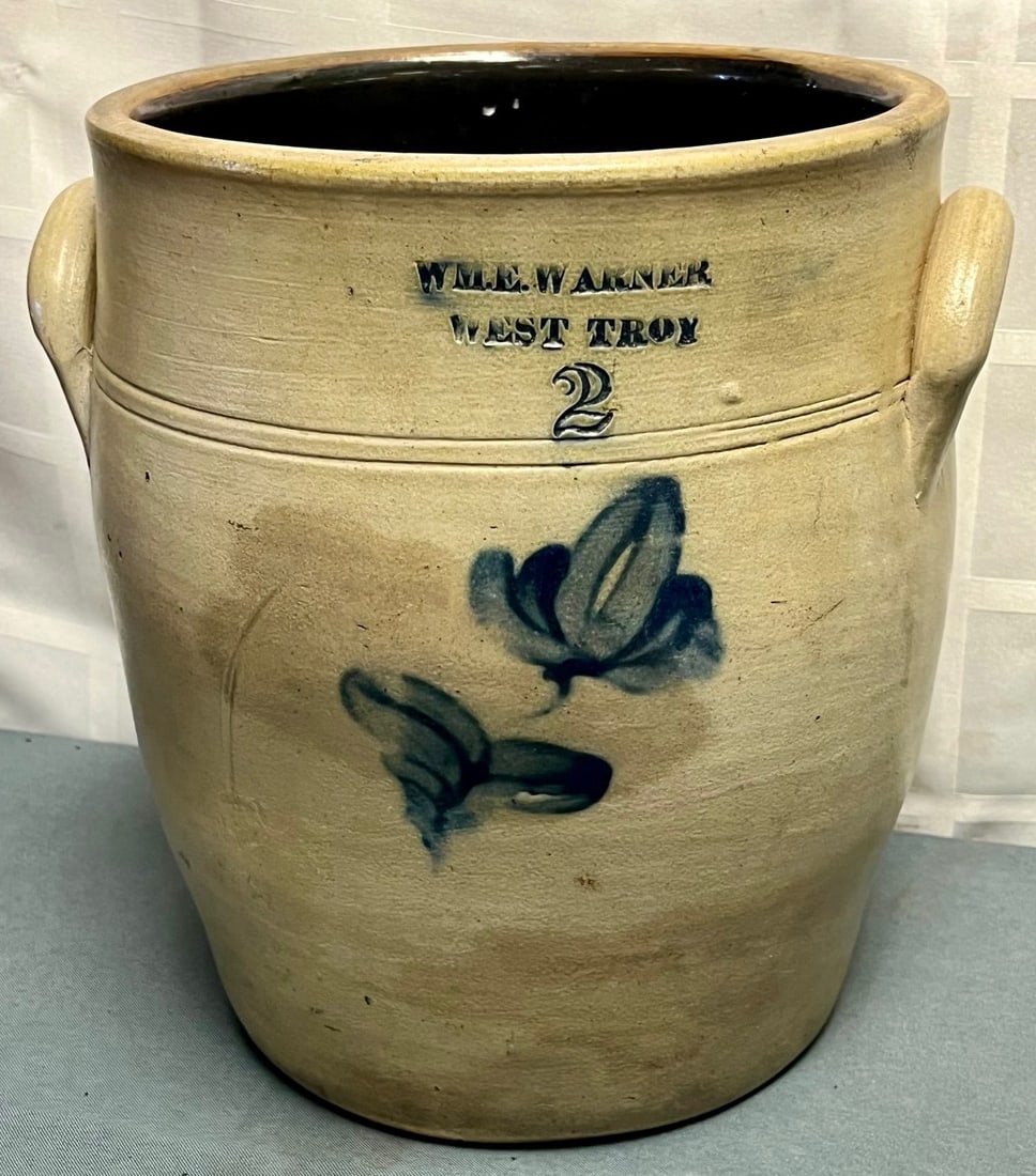 Wm. E. Warner West Troy (N.Y.) 2 Gallon Stoneware Crock with Cobalt Floral Decoration: Wm. E. Warner West Troy (N.Y.) 2 Gallon Stoneware Crock with Cobalt Floral Decoration, A fine mid-19th-century 2-gallon salt-glazed stoneware crock stamped “Wm. E. Warner / West Troy”, featuri
