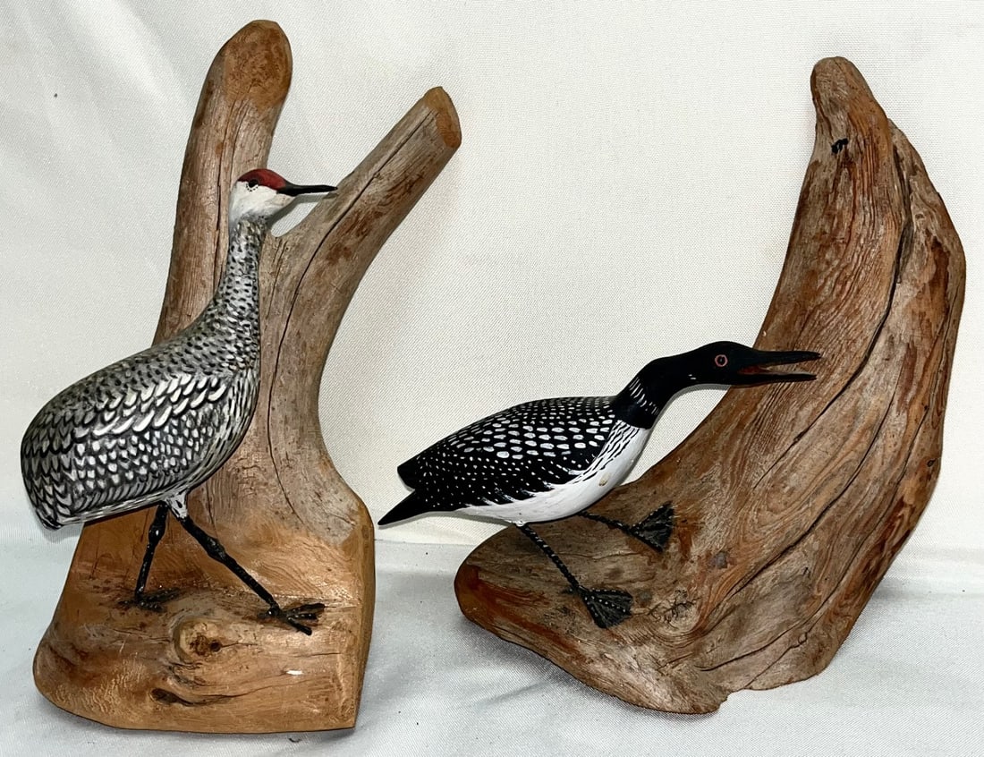 Two Del Higgins Hand Carved & Painted Driftwood Bird Sculptures – Maine Folk Art: Del Higgins Hand Carved & Painted Driftwood Bird Sculptures – Loon and Crane, Maine Folk Art, Original hand carved and painted driftwood bird sculptures by Del Higgins (Dexter, Maine). These whimsic