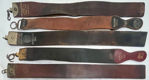 Group of Five Vintage Barber’s Leather Razor Strops — Hammacher Schlemmer, J.R. Torrey, etc.