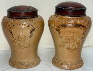 Pair of 19th-Century French “MACOUBA" Stoneware Tobacco Jars with Relief Figures & Tin Lids