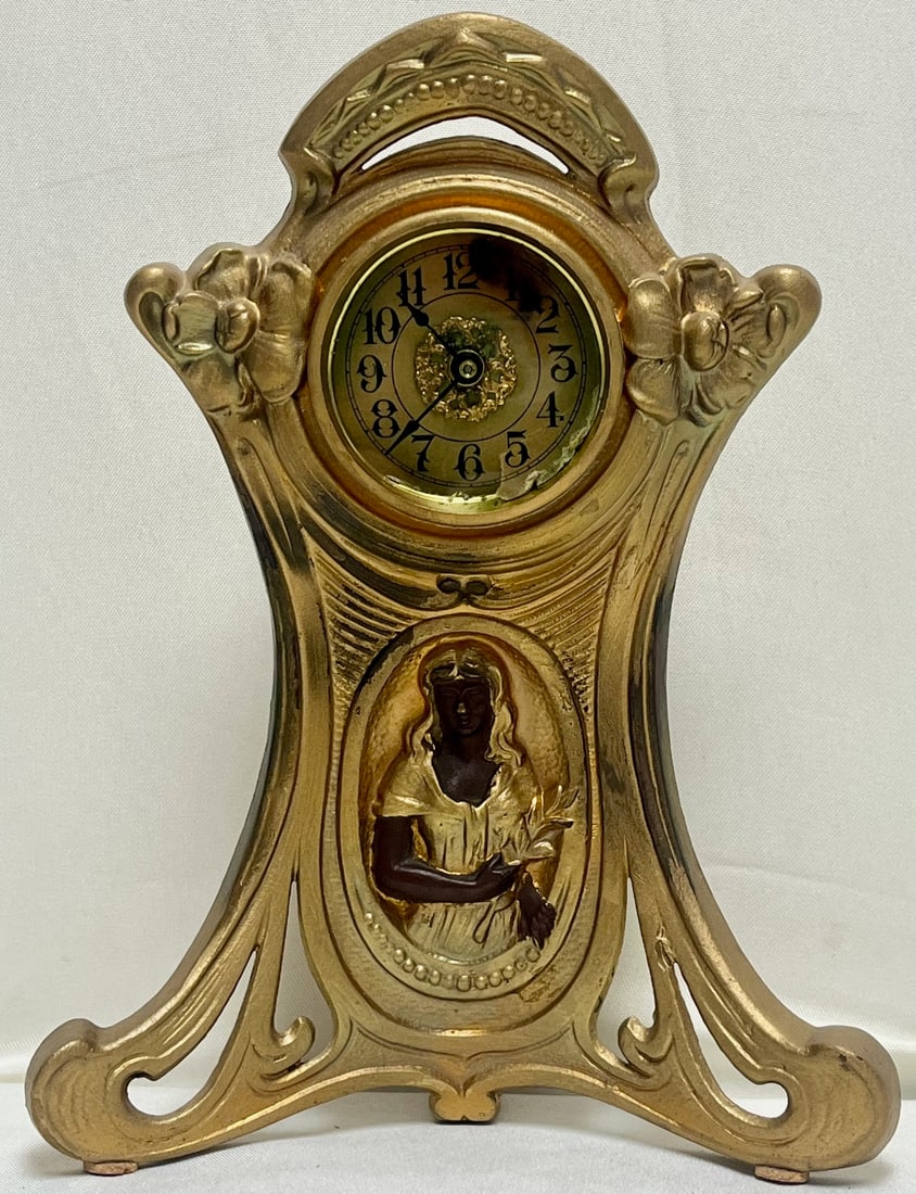 Art Nouveau Gilt Spelter Figural Mantel Clock With Maiden in Relief — ca. 1900: Art Nouveau Gilt Spelter Figural Mantel Clock With Maiden in Relief — ca. 1900, Elegant Art Nouveau period figural mantel clock, cast in gilt spelter with flowing organic lines and floral decoration