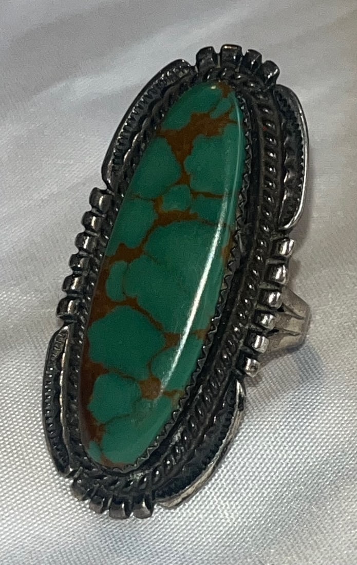 Ronald Dale Navajo Sterling Silver Long Green Turquoise Statement Ring – 11.19 grams: Ronald Dale Navajo Sterling Silver Long Green Turquoise Statement Ring – 11.19 grams, SIZE 8/8.5, A bold and impressive handmade Navajo sterling silver ring by noted silversmith Ronald Dale, featuri