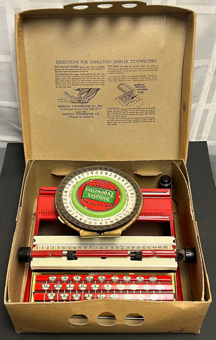 Vintage Simplex Practical Toy Typewriter No. 200 w/ Original Box & Ink Bottle, Tin Litho, c.: Vintage Simplex Practical Toy Typewriter No. 200 with Original Box & Ink Bottle, Tin Litho, c. 1920s–30sCharming early 20th-century Simplex “Practical” Typewriter, Number 200 , a classic ind