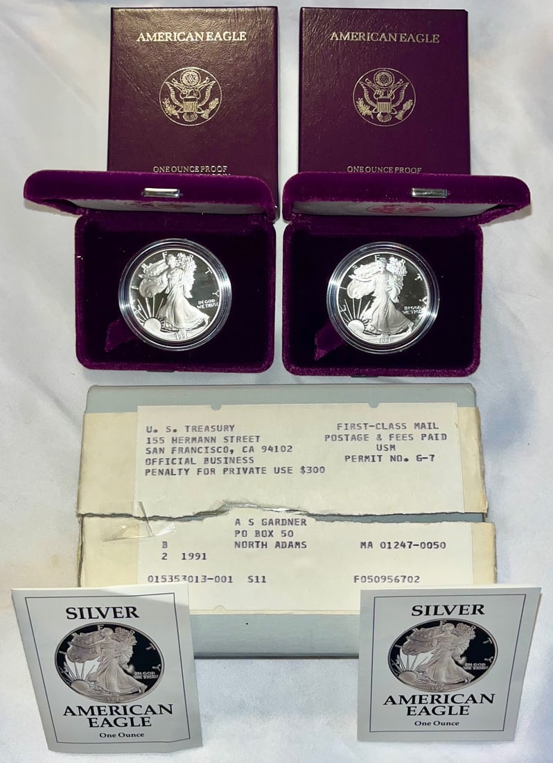 1991 American Silver Eagle Proof Coins – Lot of 2 – Original Velvet Cases, COAs & Mint Shipping: 1991 American Silver Eagle Proof Coins – Lot of 2 – Original Velvet Cases, COAs & Mint Shipping Box, matched pair of 1991 American Eagle One Ounce Proof Silver Coins, each presented in its origina