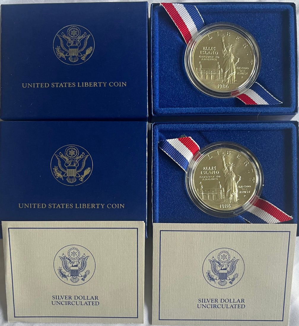 Two (2) 1986-P Statue of Liberty / Ellis Island Comm. Silver Dollars, Original U.S. Mint Packaging: Two (2) 1986-P Statue of Liberty / Ellis Island Commemorative Silver Dollars – Brilliant Uncirculated in Original U.S. Mint Packaging w/ COAs, Offered is a lot of two original 1986 U.S. Mint Statue