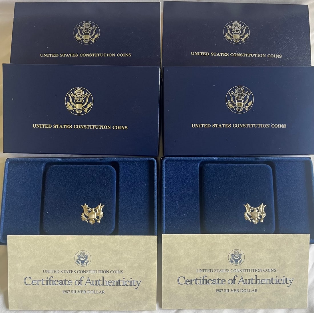 Two (2) 1987-S U.S. Constitution Bicentennial Silver Dollars – Proof – OGP Boxes & COAs: Two (2) 1987-S U.S. Constitution Bicentennial Silver Dollars – Proof – OGP Boxes & COAs, 90% Silver, Offered is a two-coin lot of 1987 United States Constitution Bicentennial Commemorative Silver