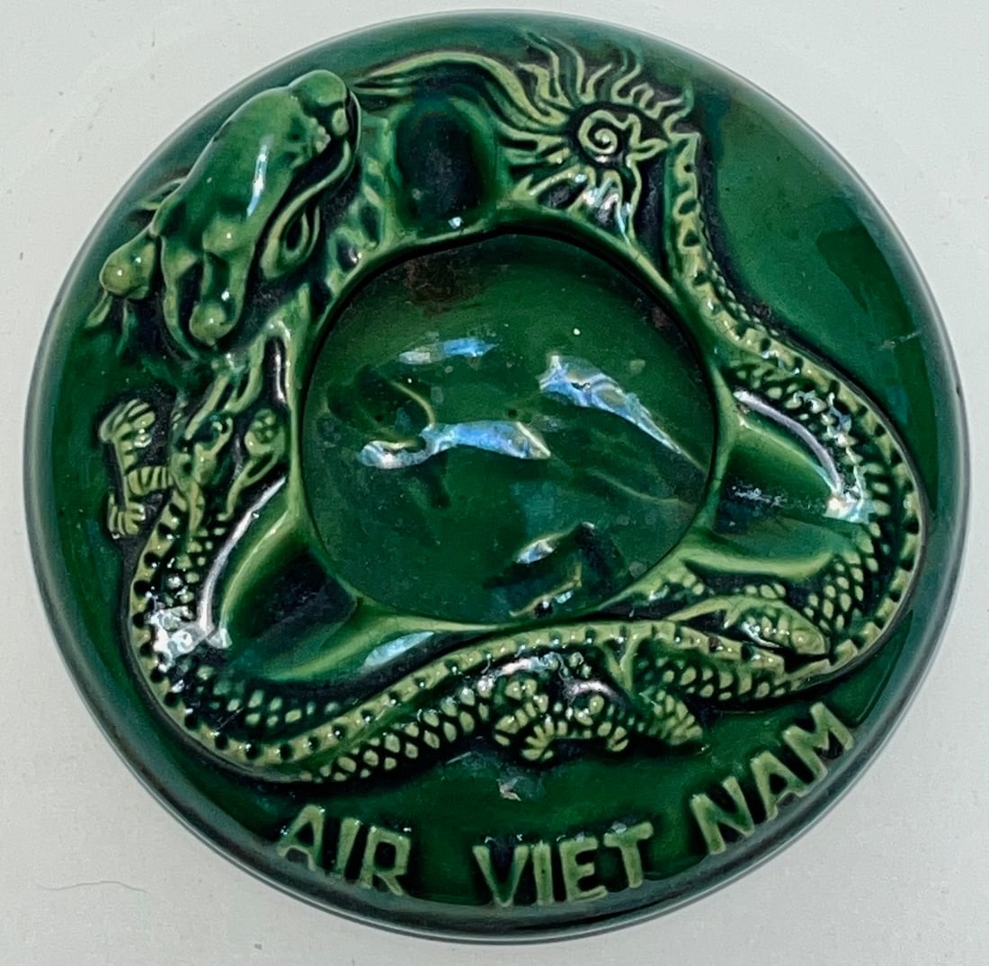 Vintage Vietnam War Era “Air Viet Nam” Green Dragon Ceramic Ashtray, c. 1960s–: Vintage Vietnam War Era “Air Viet Nam” Green Dragon Ceramic Ashtray, c. 1960s–1970s, MEASURES APPROX. 5" DIAMETER, 2 1/4" HIGH, vintage ceramic ashtray featuring a boldly modeled Chi