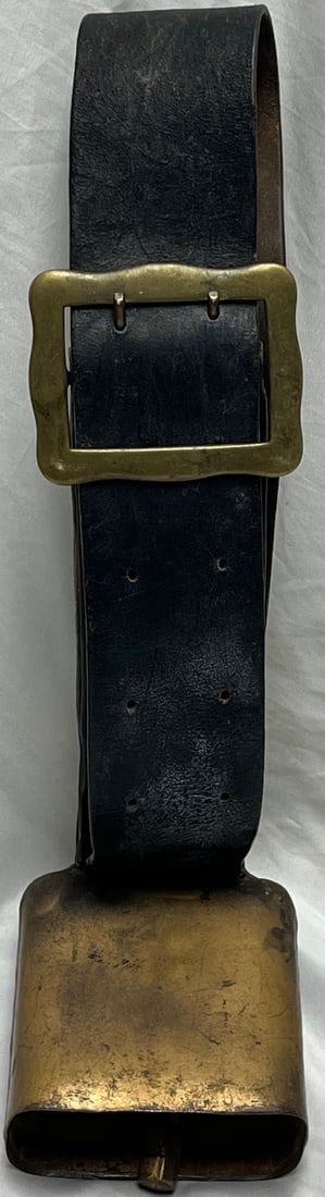 Antique Metal Livestock Cow Bell with Wide Leather Strap and Large Brass Buckle, Marked: Antique Metal Livestock Cow Bell with Wide Leather Strap and Large Brass Buckle, Marked, Large antique livestock cow bell featuring a hand-formed metal bell in old gold paint and mounted on a heavy bl