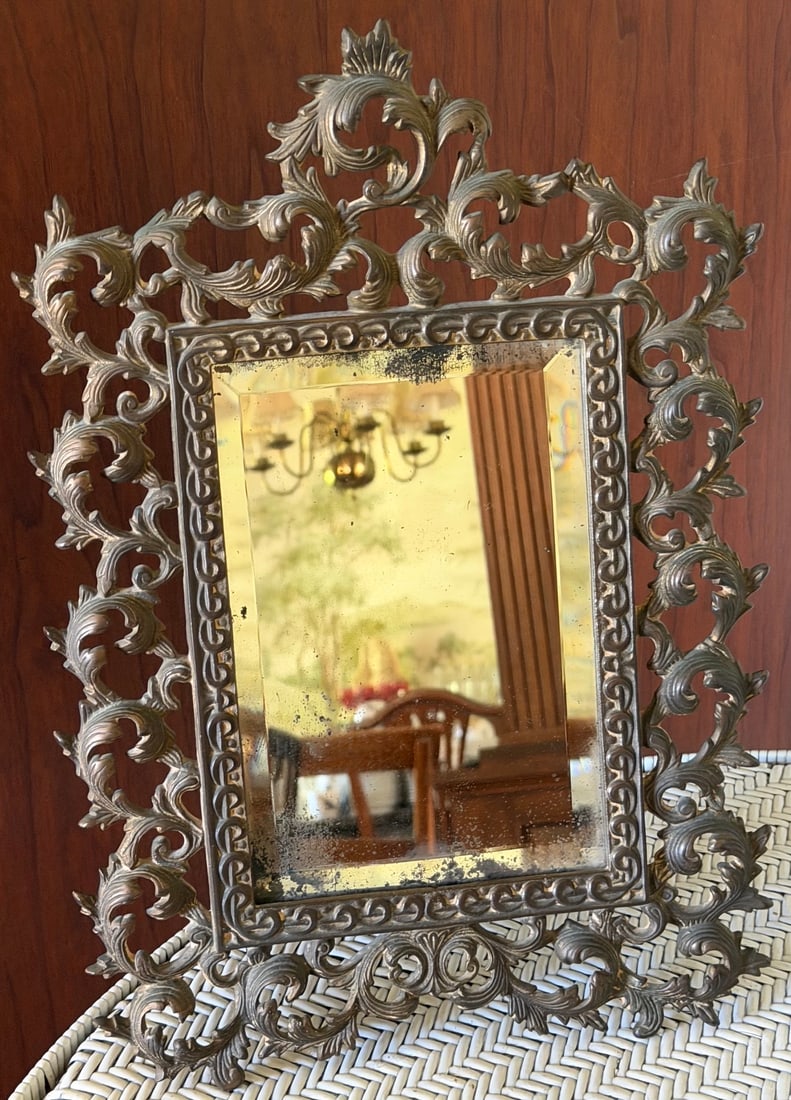 Vintage Rococo Style Gilt Brass Table Mirror, Beveled Glass, No. 1290: Decorative vintage Rococo Revival tabletop or vanity mirror featuring an elaborate cast metal frame with pierced scrolling acanthus leaf and foliate decoration. The rectangular mirror has a wide bevel