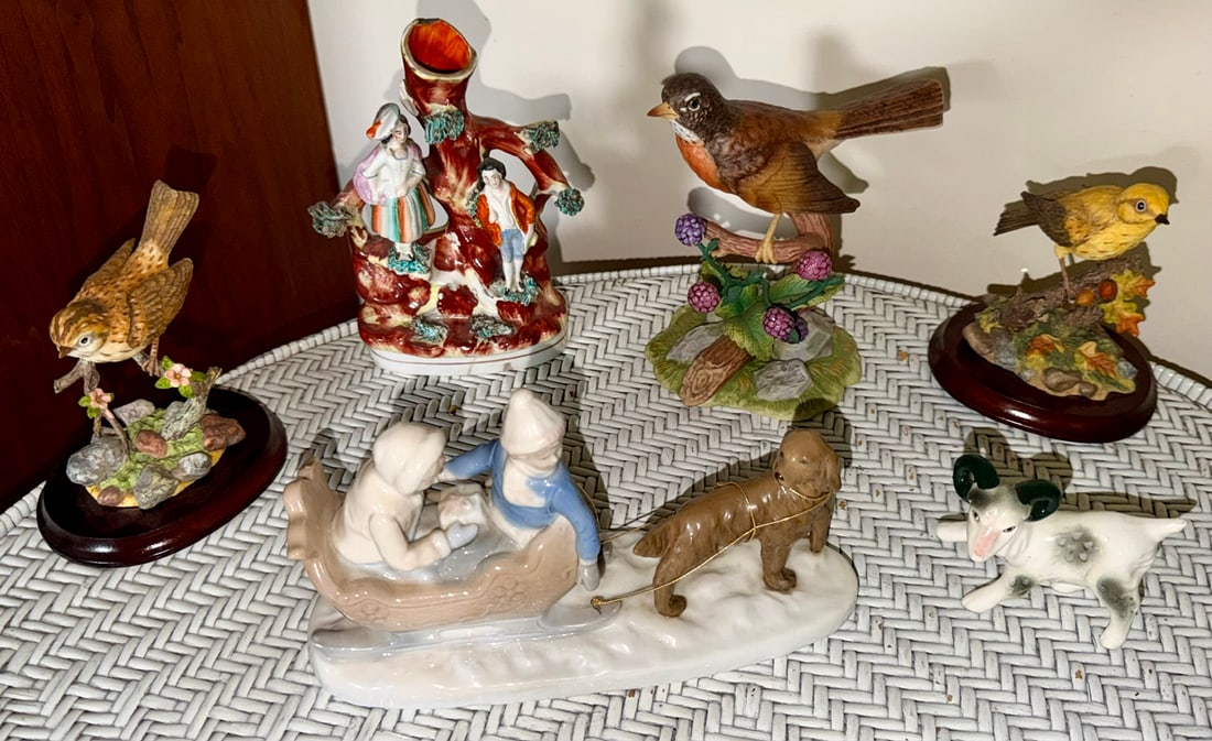 Group of 6 Porcelain Bird & Figural Collectibles, Maruri, Vintage, 19th C. Staffordshire: Group of six porcelain decorative figures highlighted by a 19th-century English Staffordshire figural spill vase, modeled as a young courting couple standing beside a large hollow tree trunk with appl