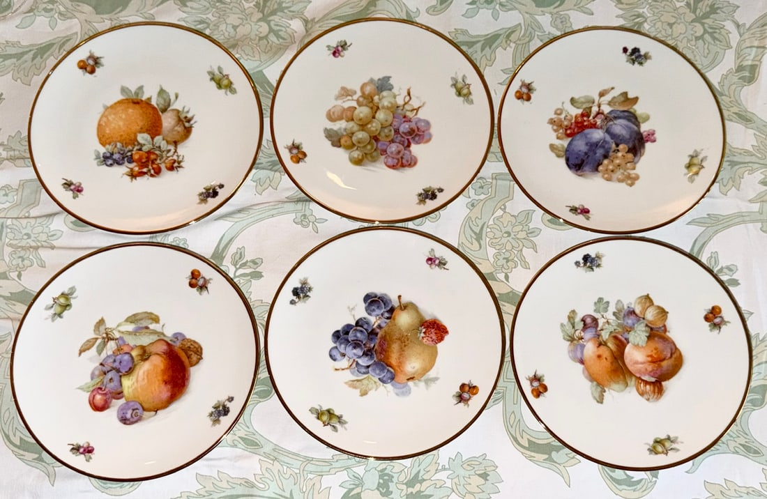 Set of 6 Schumann Arzberg Bavaria Porcelain Fruit Plates: Set of six vintage Bavarian porcelain dessert or luncheon plates by Schumann, Arzberg, Germany. Each plate features a different naturalistic fruit composition, including grapes, plums, pears, apples a