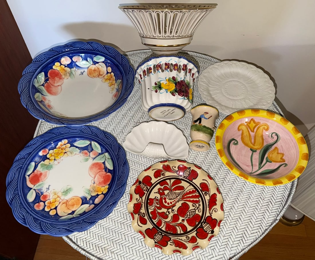 Group of Italian & European Art Pottery and Porcelain, 9 Pieces: Decorative group of nine ceramic and porcelain pieces, primarily Italian, featuring colorful hand-painted and molded designs.Includes a striking Lorenzo Fatica, Korend hand-decorated pottery plate wit