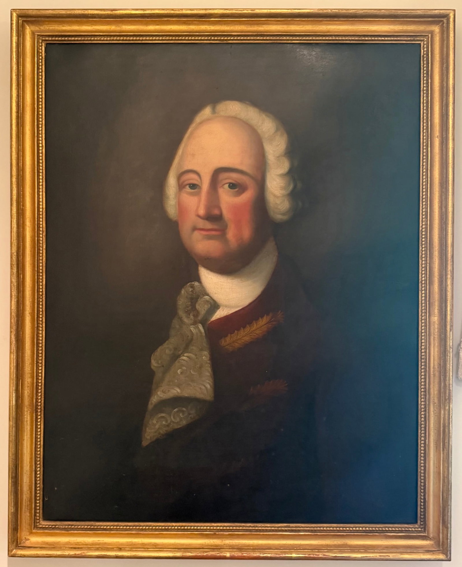 18th/19th C. Portrait of George Washington, Inscribed “Washington by M.R. Reynolds / Painted: Large oil on canvas portrait depicting George Washington in bust-length format, shown wearing a powdered white wig, patterned cravat and dark coat with embroidered foliate decoration. Presented in a