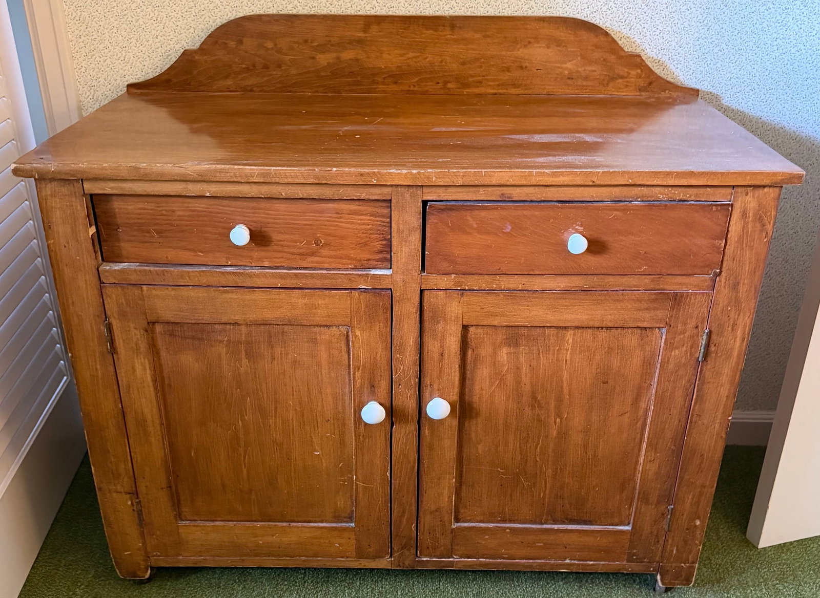 Antique American Country Pine / Poplar Two-Door Washstand Cabinet, c. 1860-80: Antique American country dry sink or washstand cabinet, mid to late 19th century. Constructed primarily of pine and other secondary woods with a warm stained finish. Features a broad rectangular work 