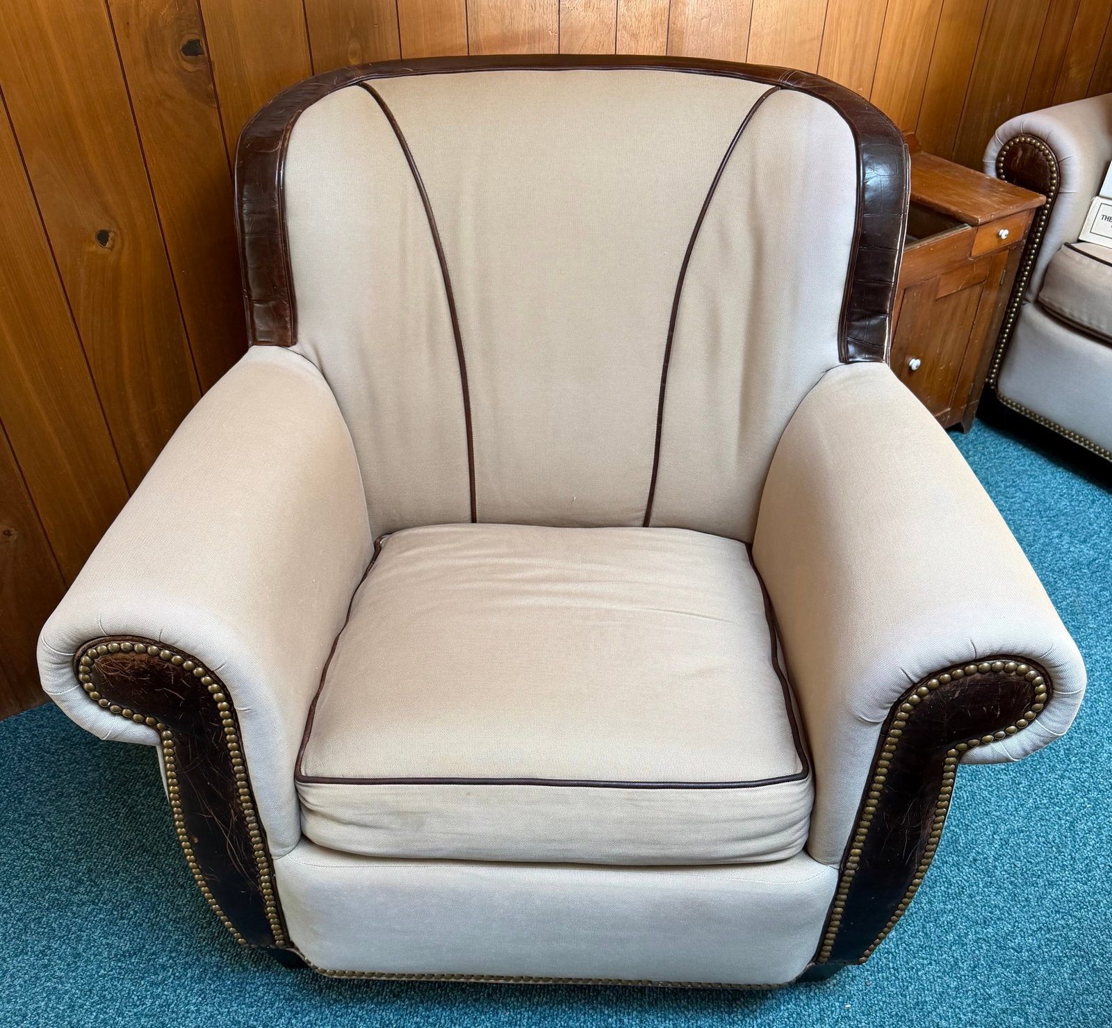 Orvis Leather & Upholstered Club Armchair with Brass Tack Trim: Handsome Orvis club-style armchair featuring neutral cream/tan fabric upholstery accented with dark brown leather trim and piping. The generously proportioned chair has a high rounded back, rolled and
